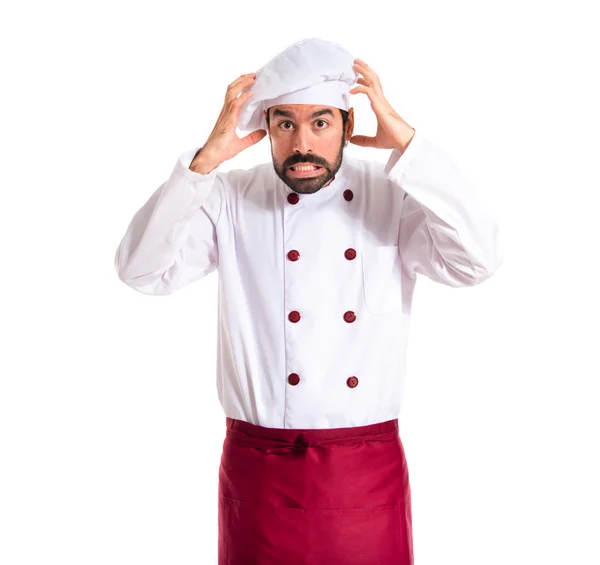 Gefrustreerd chef-kok op witte achtergrond — Stockfoto