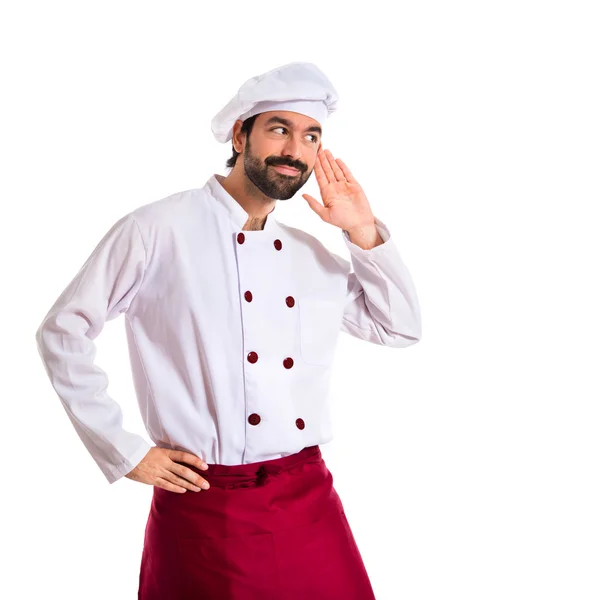 Chef-kok luisteren op witte achtergrond — Stockfoto