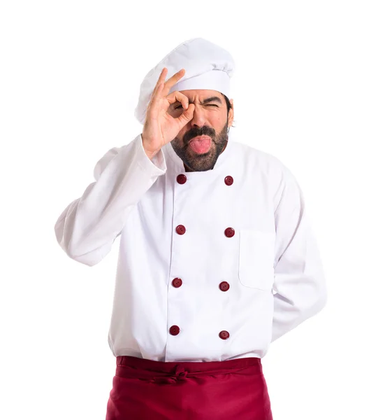 Шеф-повар шутит на белом фоне — стоковое фото