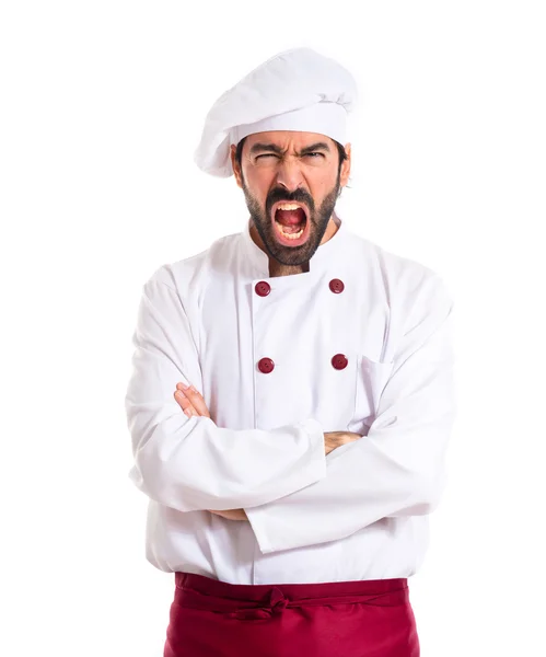 Злой шеф-повар кричит на белом фоне — стоковое фото