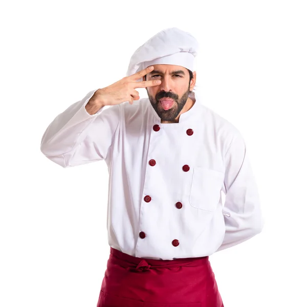 Chef haciendo una broma sobre fondo blanco —  Fotos de Stock