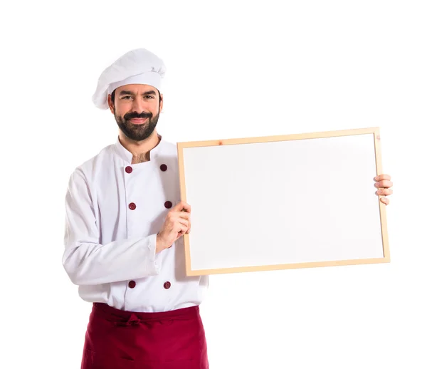 Chef sosteniendo cartel vacío — Foto de Stock