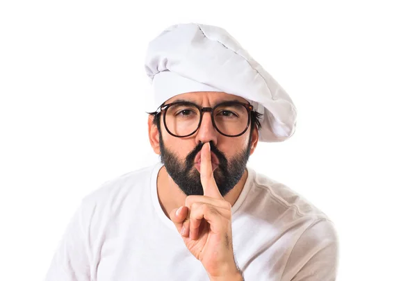 Chef making silence gesture over white background — Stock Photo, Image