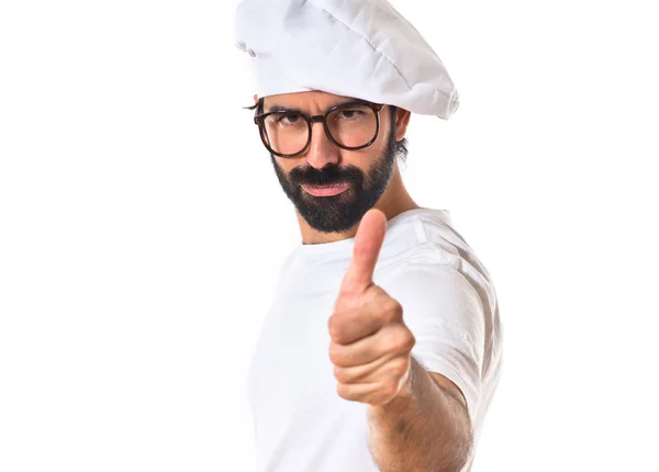 Шеф-кухар з великим пальцем над білим тлом — стокове фото