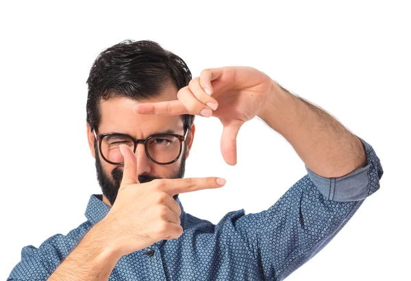 Young hipster man focusing with his fingers — Stock Photo, Image