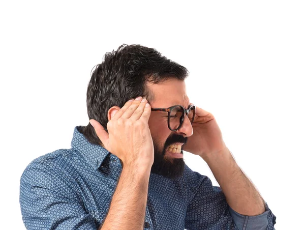 Frustrated young hipster man over white background — Stock Photo, Image