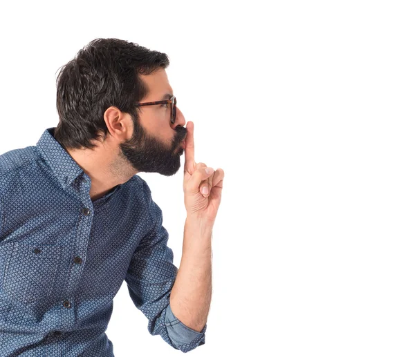 Ung hipster man gör tystnad gest — Stockfoto