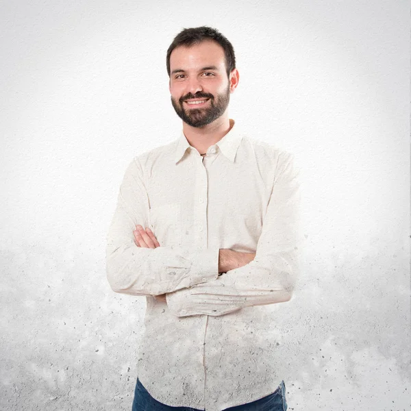 Homem de negócios com os braços cruzados sobre fundo isolado — Fotografia de Stock