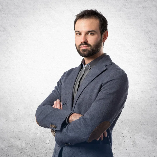 Business man with his arms crossed over isolated background — Stock Photo, Image