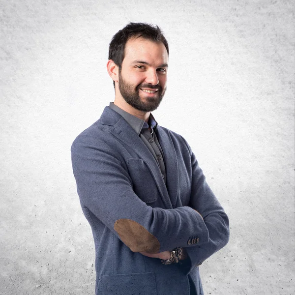 Businessman with arms crossed over isolated background — Stock Photo, Image