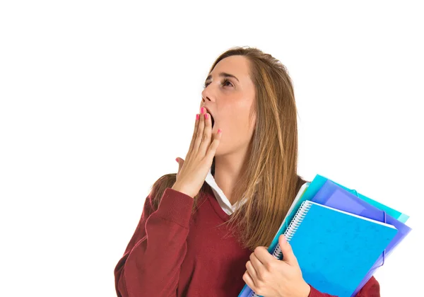 Estudiante bostezando sobre fondo blanco aislado — Foto de Stock