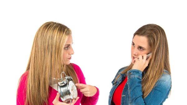 Student woman talking to mobile over white background — Stock Photo, Image