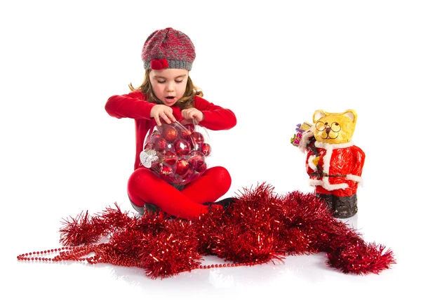 Kleines Mädchen mit weihnachtlichen Elementen — Stockfoto