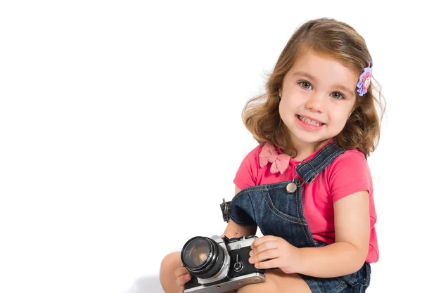 Niño fotografiando sobre fondo blanco —  Fotos de Stock