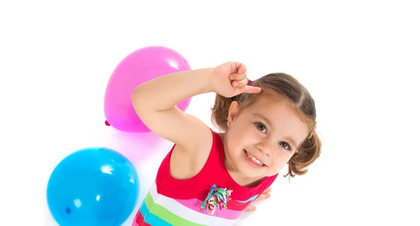 Kid playing with balloons over white background — Stock Photo, Image