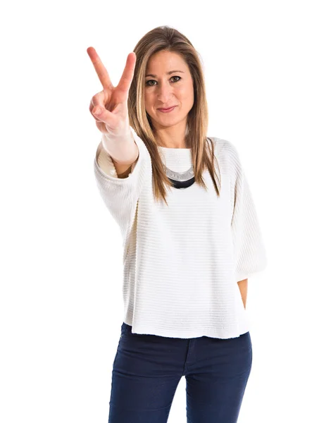 Woman doing victory gesture — Stock Photo, Image