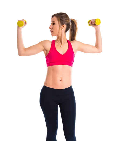 Sport kvinde gør vægtløftning - Stock-foto