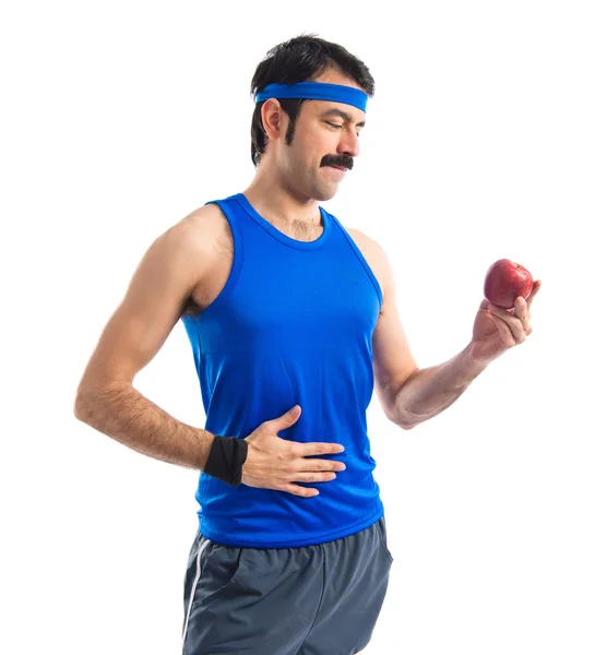 Sportman con una mela in mano — Foto Stock