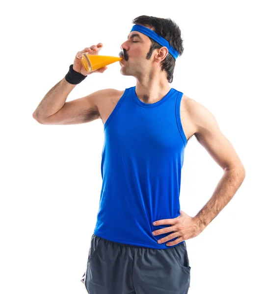 Vintage sportman drinking orange juice — Stock Photo, Image