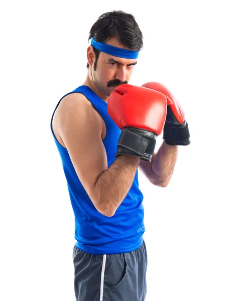 Pazzo sportivo con i guanti da boxe — Foto Stock