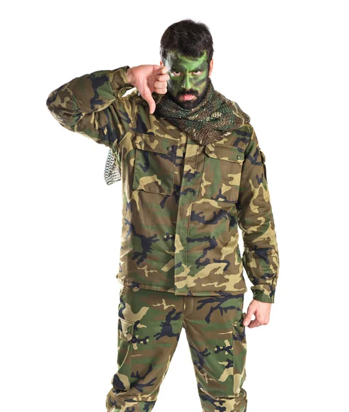 Soldier doing bad signal — Stock Photo, Image