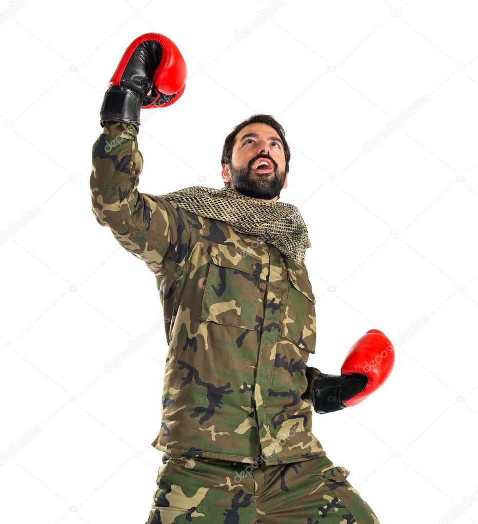 Soldier with boxing gloves 