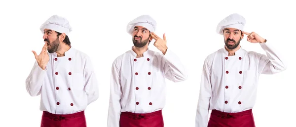 Шеф-кухар робить жест самогубства на білому тлі — стокове фото