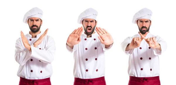 Chef making stop sign over white background — Stock Photo, Image