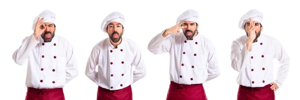 Chef-kok maken van een grap op witte achtergrond — Stockfoto