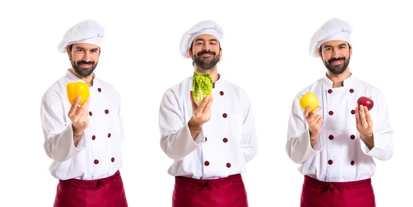 Chef holding a lettuce — Stock Photo, Image