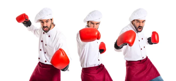 Chef con guantes de boxeo sobre fondo blanco —  Fotos de Stock