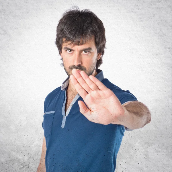Man doing NO gesture over white background — Stock Photo, Image