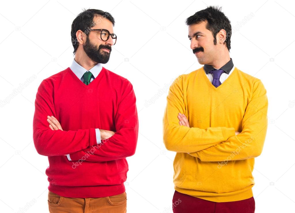 Twin brothers with arms crossed — Stock Photo © luismolinero 64932733