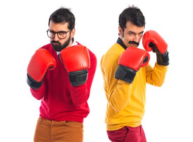 Twin brothers with boxing gloves 