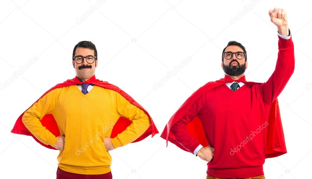 Twin brothers dressed like superheros