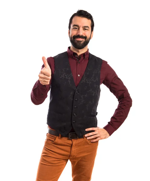 Homem usando colete com o polegar para cima — Fotografia de Stock