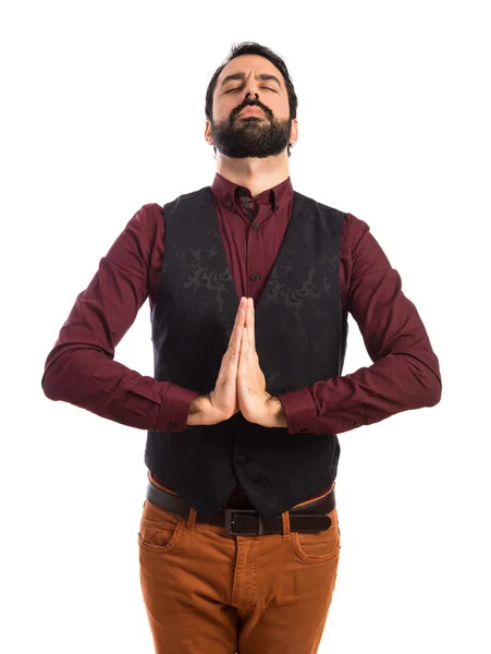Man wearing waistcoat in zen position — Stock Photo, Image