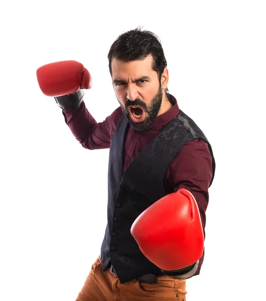 Man wearing waistcoat with boxing gloves — Stock Photo, Image