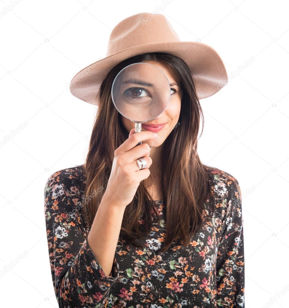 Woman with magnifying glass 