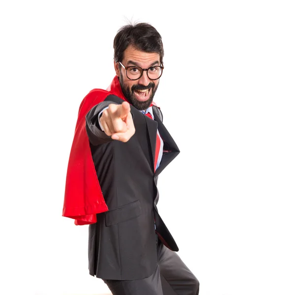 Businessman dressed like superhero pointing to the front — Stock Photo, Image