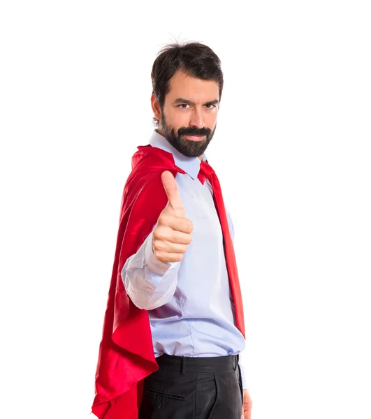 Бизнесмен, одетый как супергерой с большим пальцем вверх — стоковое фото