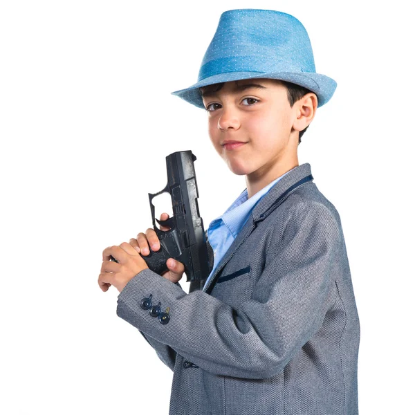 Gangster pojke håller en pistol — Stockfoto