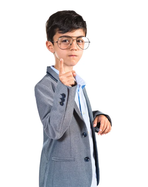 Child with vintage glasses pointing to the front — Stock Photo, Image