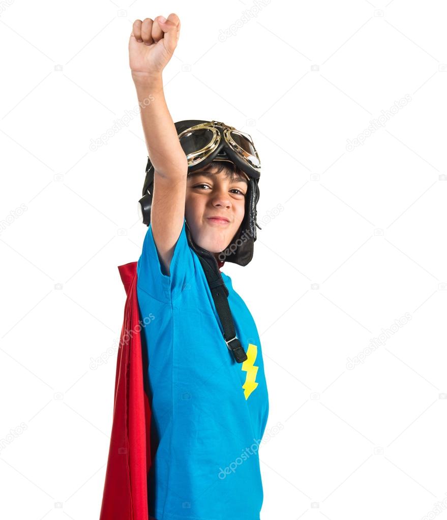 Child dressed like superhero