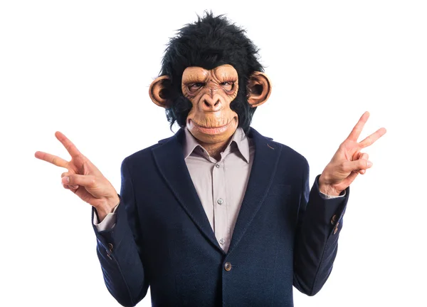 Monkey man doing victory gesture — Stock Photo, Image