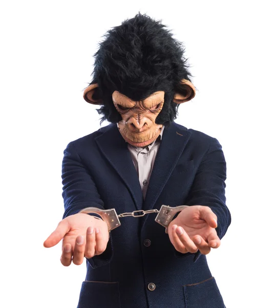 Monkey man with handcuffs — Stock Photo, Image