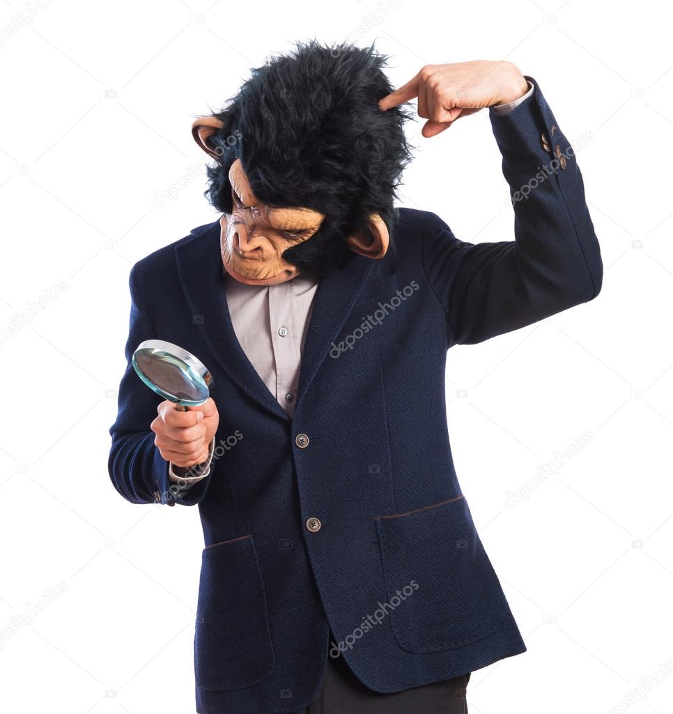 Monkey man with magnifying glass