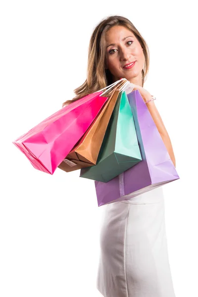 Woman with many shopping bags — Stock Photo, Image