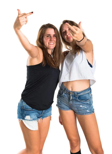 Dois amigos fazendo gesto chifre — Fotografia de Stock