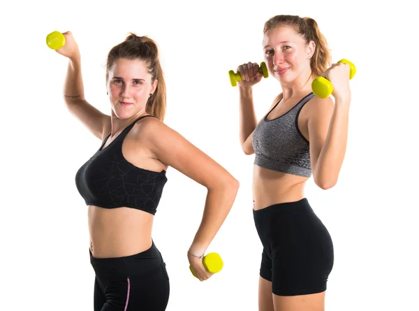 Donne sportive che fanno sollevamento pesi — Foto Stock